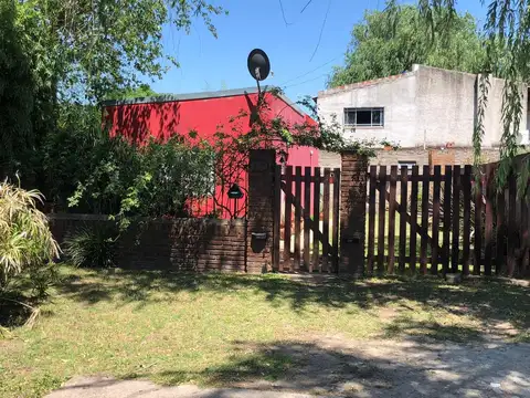 VENTA CASA CON TERRENO