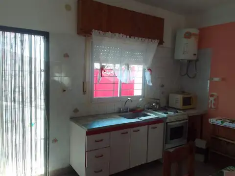 CASA + DEPARTAMENTO + COCHERA DESCUBIERTA + PATIO