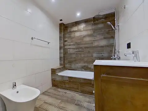 Triplex 3 ambientes con Jardín Parrilla y Cochera