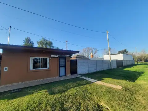 Casa + Galpón en Roldán