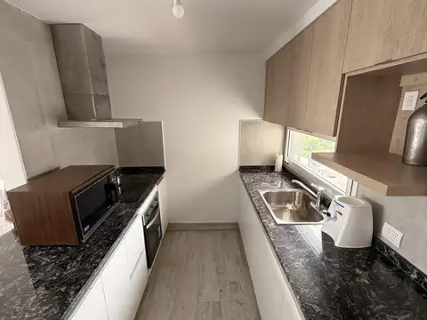 Departamento con cochera y baulera