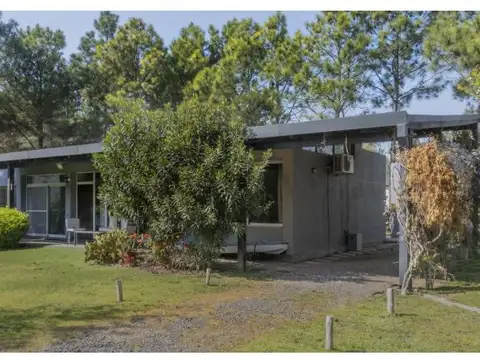 Puerto Paraiso. Casa de 2 dormitorios con parque.