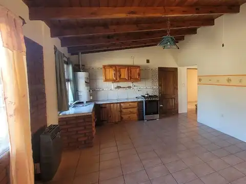 CASA FAMILIAR CON TERRENO AMPLIO