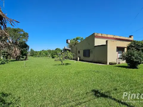 Casa 9 ambientes con 2 baños