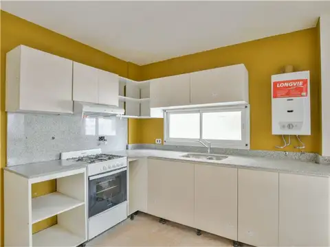 DEPARTAMENTO EN VENTA TRES DORM CON COCHERA CENTRO