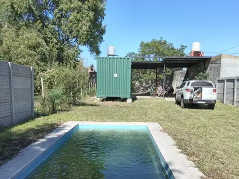 CASA CONTENEDOR DE UNA HABITACION AMUEBLADA 