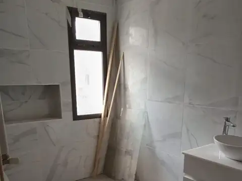 Depto Tipo Casa 3 ambientes con 2 baños