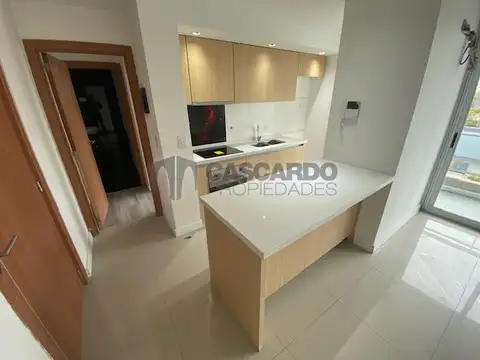 Departamento de 2 ambientes con balcón al frente y cochera subterranea cubierta