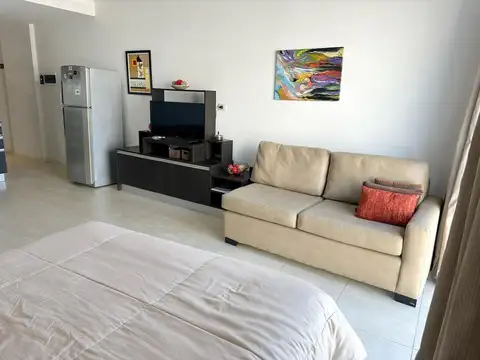 Condominio amoblado .-