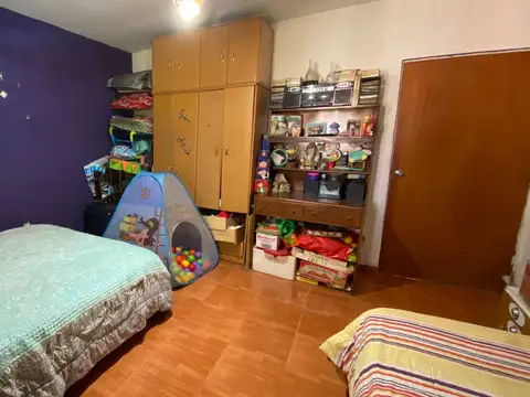 CASA 3 AMBIENTES LOTE PROPIO CON PARQUE Y QUINCHO