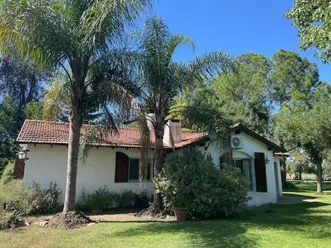 5 has de campo con excelente mejoras y ubicación.