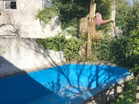 Casa 3 ambientes con pileta y garaje en Venta - Villa Tesei