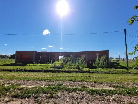 Terreno en Arana, barrio "Pampa Norte" con estructura de casa edificada