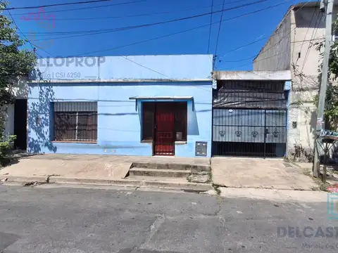 Casa de 3 ambientes en lote propio de 297 m² con jardín y cochera