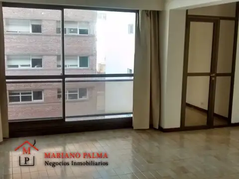 DEPARTAMENTO DE 2 AMB CON ESCRITORIO. COCHERA