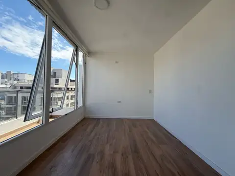 Departamento de 1 dormitorio con balcón aterrazado y parrillero. Centro, Rosario.