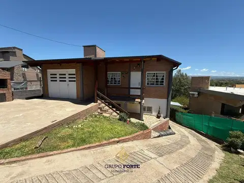 CASA EN VENTA CON DEPARTAMENTO EN BARRIO BECCIU, CARLOS PAZ 