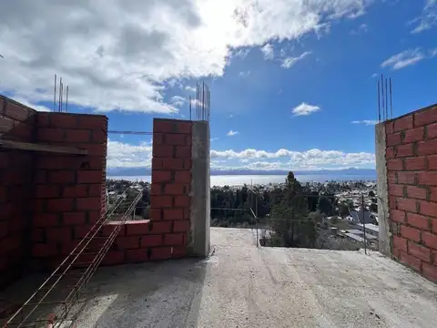 Monoambiente con terraza y vista plena al lago