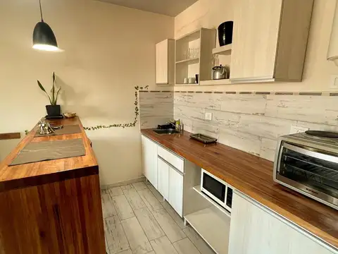 Monoambiente con balcón, cochera y terraza exclusiva. Gordillo al 3800