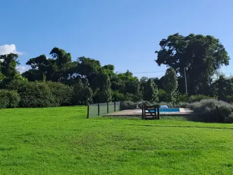 Chacra de una hectarea con casa en Camara Quijano