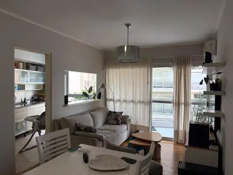 Alquiler metros Río 2 dormitorios con  cochera $950.000 .