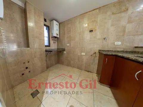 Departamento 4 ambientes con patio y balcon