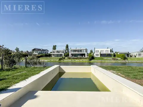 Casa en venta a estrenar sobre lote a la laguna area 1 San Matias