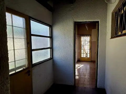 VENTA CASA CIUDAD EVITA 3 AMB COCHERA PILE Y DEPTO