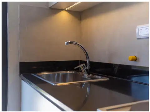 Tigre venta triplex en barrio cerrado con patio y jardín.