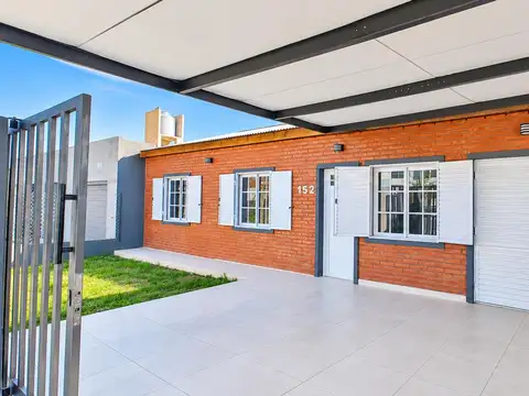 Amplia casa con jardin