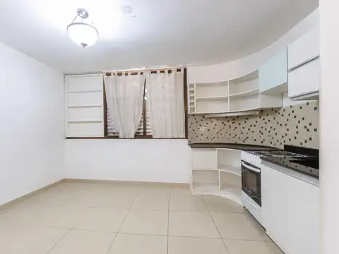 DEPARTAMENTO DE 2 DORMITORIOS CON PATIO EN BARRIO CENTRO