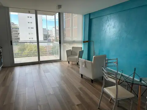 Depto 2 amb con cochera fija y balcones 