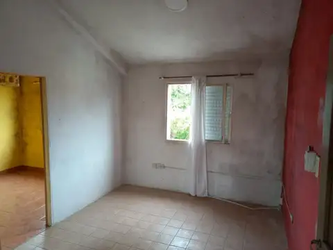 Dpto de 2 dormitorios, un baño, patio con parrillero.