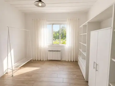 casa con jardin y parrilla