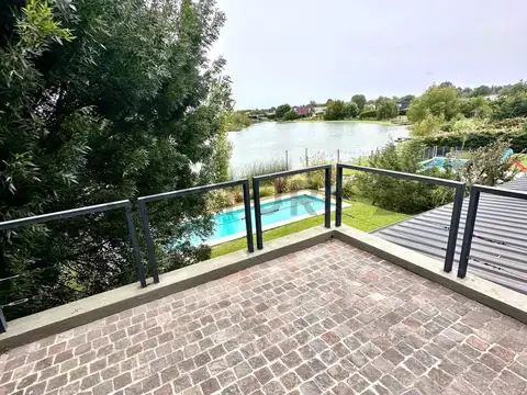 Casa a la Laguna en Venta en El Canton, Vista Abierta, Pileta y Muelle Propio