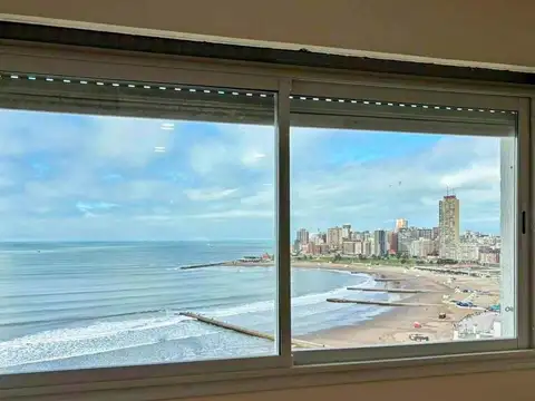 1 AMBIENTE CON VISTA PANORAMICA AL MAR