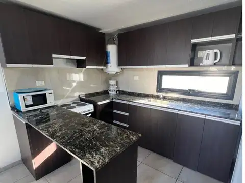 DUPLEX EN VENTA AMOBLADO Y CON COCHERA EN VILLA CARLOS PAZ 