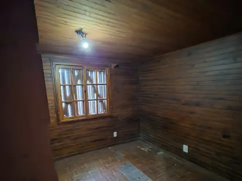 En venta amplio terreno con cabaña