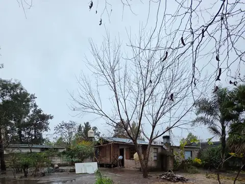 En venta amplio terreno con cabaña