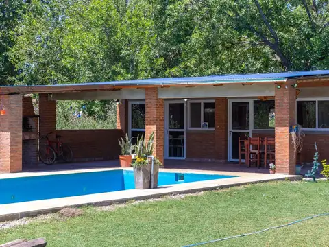 VENTA QUINCHO DE DOS DORMITORIOS Y PILETA. IBARLUCEA