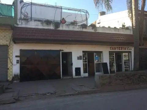 Casa y dos departamentos
