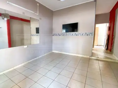 Av. Centenario  al 900, entre Nicolas Avellaneda y o higgins