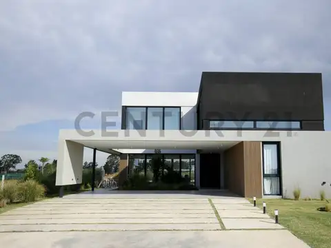 CASA EN VENTA EN PUERTO NIZUC - 4 DORMITORIOS+ESCRITORIO - QUINCHO - PISCINA