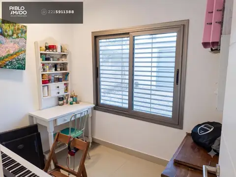 Casa 9 ambientes con 2 baños