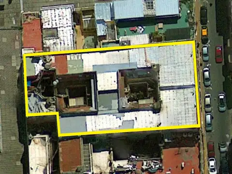 EDIFICIO DE LOCALES COMERCIALES Y VIVIENDAS ALQUILADAS