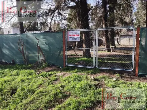 Terreno arbolado, amojonado y alambrado