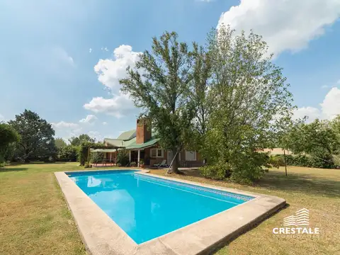 Venta / permuta | Casa 4 dormitorios con amplio terreno y pileta | Roldán