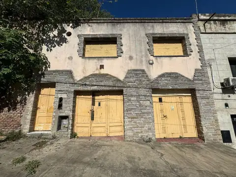 Terreno con casa a demoler