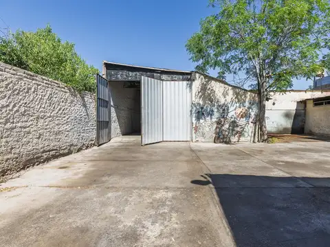 Casa con galpones
