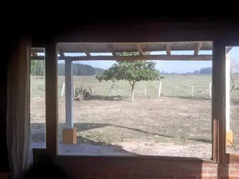 VENDO CHACRA DE 15 HAS. CON CASA DE CAMPO MUY CERCA DEL CENT